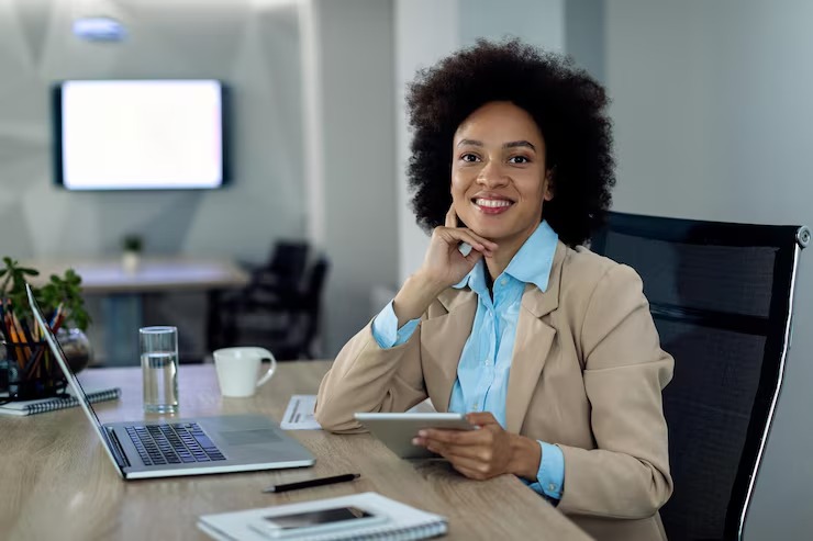 African business leader at her desk